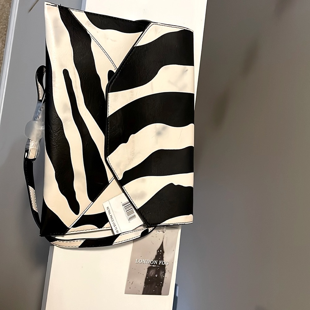 Black and white leather clutch that will stop you in your tracks